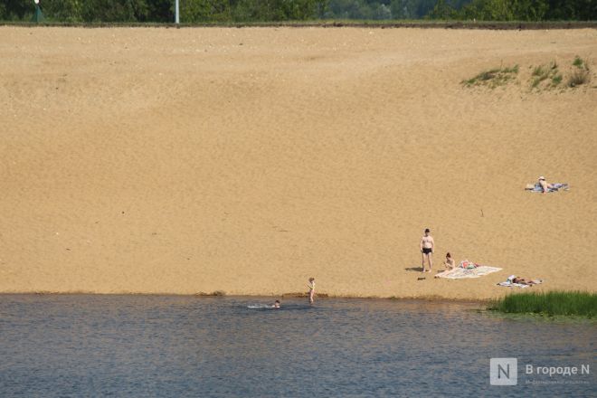 Спасение от адского пекла: фоторепортаж с пляжей Нижнего Новгорода - фото 17