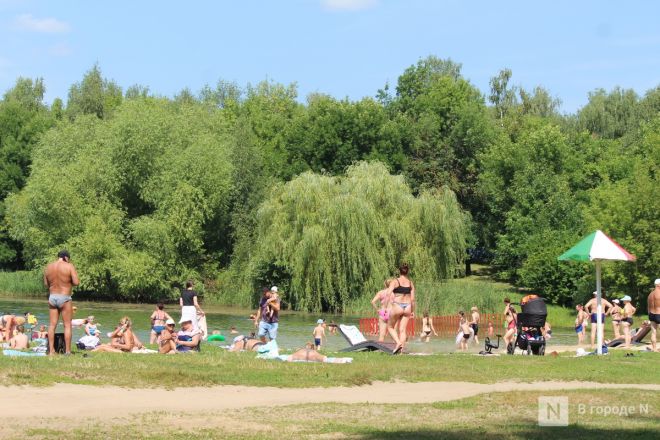 Выживание в жару: фоторепортаж с пляжей Нижнего Новгорода - фото 85