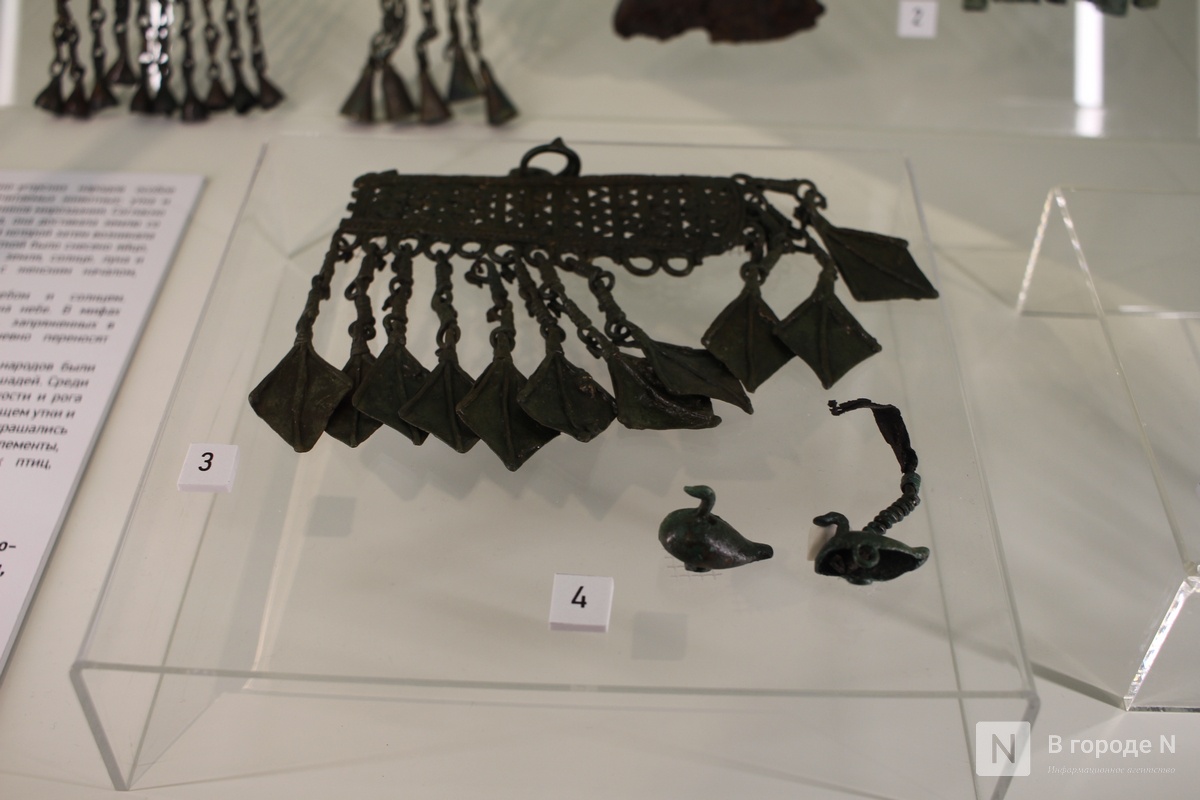 Монеты, украшения и боевые топоры: фоторепортаж с выставки археологических находок в Нижнем Новгороде - фото 11